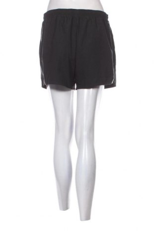 Γυναικείο κοντό παντελόνι Nike, Μέγεθος L, Χρώμα Μαύρο, Τιμή 21,25 €