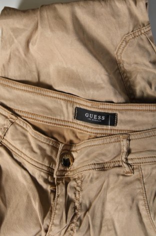 Damskie spodnie Guess, Rozmiar S, Kolor Beżowy, Cena 123,93 zł