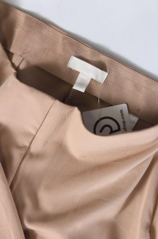 Damskie spodnie H&M, Rozmiar L, Kolor Beżowy, Cena 27,83 zł