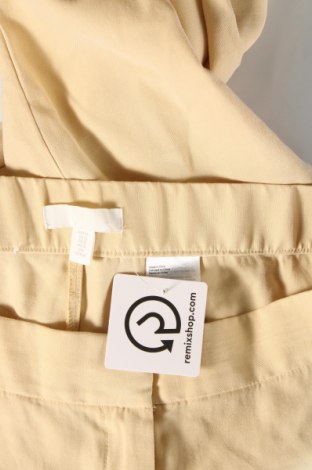 Damskie spodnie H&M, Rozmiar XL, Kolor Żółty, Cena 49,56 zł