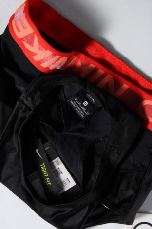 Γυναίκειο αθλητικό τοπ Nike, Μέγεθος XS, Χρώμα Μαύρο, Τιμή 28,69 €