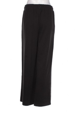 Γυναικείο αθλητικό παντελόνι Bershka, Μέγεθος M, Χρώμα Μαύρο, Τιμή 23,71 €