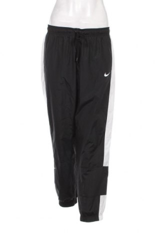 Γυναικείο αθλητικό παντελόνι Nike, Μέγεθος M, Χρώμα Μαύρο, Τιμή 20,97 €
