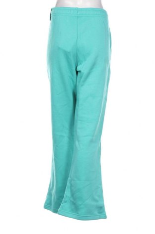 Γυναικείο αθλητικό παντελόνι Nike, Μέγεθος L, Χρώμα Πράσινο, Τιμή 23,97 €
