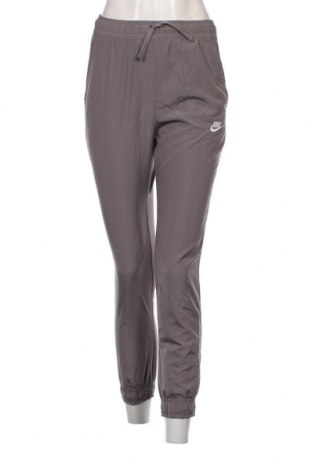 Γυναικείο αθλητικό παντελόνι Nike, Μέγεθος M, Χρώμα Γκρί, Τιμή 25,36 €