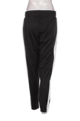 Γυναικείο αθλητικό παντελόνι Under Armour, Μέγεθος S, Χρώμα Μαύρο, Τιμή 47,94 €