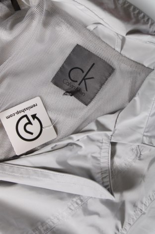 Γυναικείο μπουφάν Calvin Klein, Μέγεθος L, Χρώμα Γκρί, Τιμή 30,28 €