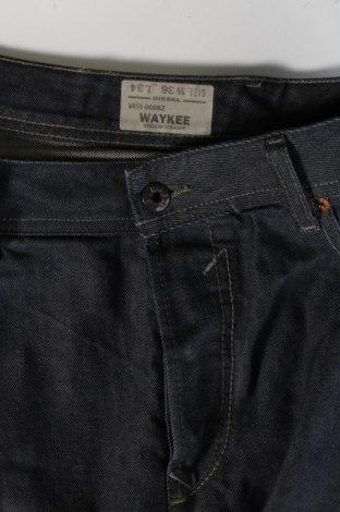Męskie jeansy Diesel, Rozmiar XL, Kolor Niebieski, Cena 142,82 zł