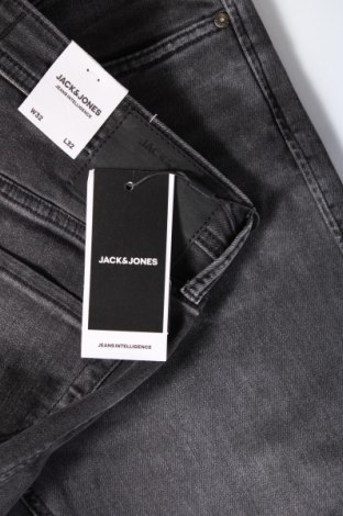 Herren Jeans Jack & Jones, Größe M, Farbe Grau, Preis 9,59 €