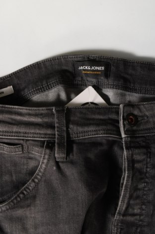 Herren Jeans Jack & Jones, Größe S, Farbe Grau, Preis 5,71 €