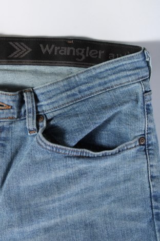 Pánske džínsy  Wrangler, Veľkosť L, Farba Modrá, Cena  48,76 €