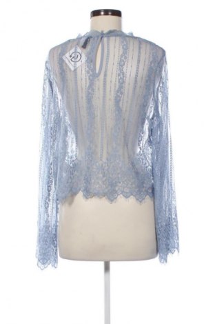 Bluzka damska H&M Divided, Rozmiar L, Kolor Niebieski, Cena 44,71 zł