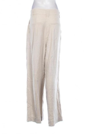 Damskie spodnie H&M, Rozmiar M, Kolor Beżowy, Cena 68,33 zł