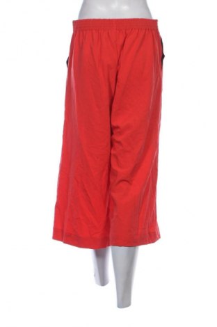 Damskie spodnie Infinity Woman, Rozmiar M, Kolor Czerwony, Cena 67,99 zł