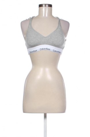 Γυναίκειο αθλητικό τοπ Calvin Klein, Μέγεθος S, Χρώμα Γκρί, Τιμή 17,97 €