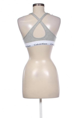 Γυναίκειο αθλητικό τοπ Calvin Klein, Μέγεθος S, Χρώμα Γκρί, Τιμή 17,97 €