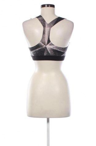 Damski sportowy top Reebok, Rozmiar S, Kolor Kolorowy, Cena 80,10 zł