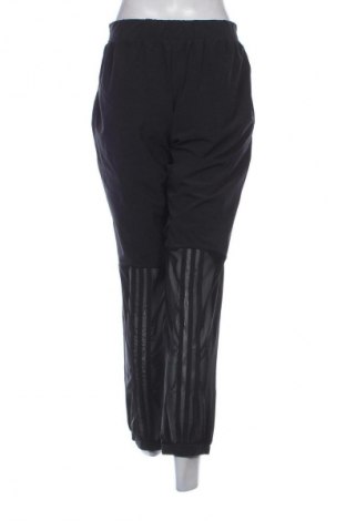Damskie spodnie sportowe Adidas, Rozmiar M, Kolor Czarny, Cena 134,99 zł