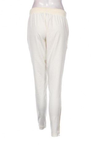Damskie spodnie sportowe Ellesse, Rozmiar M, Kolor ecru, Cena 46,99 zł