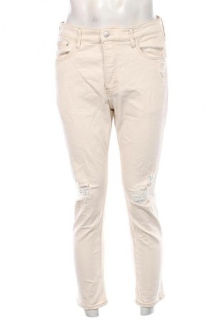 Męskie jeansy Calvin Klein Jeans, Rozmiar M, Kolor ecru, Cena 228,99 zł