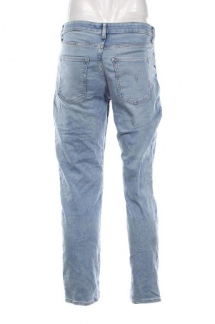 Męskie jeansy H&M, Rozmiar L, Kolor Niebieski, Cena 91,90 zł