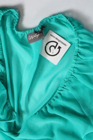 Γυναικεία μπλούζα City life, Μέγεθος L, Χρώμα Πράσινο, Τιμή 3,40 €