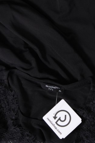Γυναικεία μπλούζα Yfl Reserved, Μέγεθος XL, Χρώμα Μαύρο, Τιμή 4,80 €