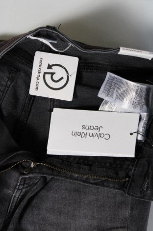 Damskie jeansy Calvin Klein, Rozmiar S, Kolor Czarny, Cena 581,07 zł