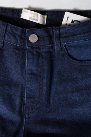 Damen Jeans Guido Maria Kretschmer for About You, Größe L, Farbe Blau, Preis 12,94 €