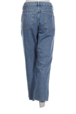 Damen Jeans Guido Maria Kretschmer for About You, Größe L, Farbe Blau, Preis 19,18 €