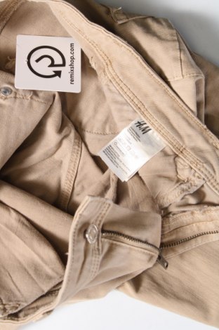 Damskie jeansy H&M, Rozmiar L, Kolor Beżowy, Cena 66,67 zł