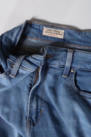 Damskie jeansy Levi's, Rozmiar L, Kolor Niebieski, Cena 117,55 zł