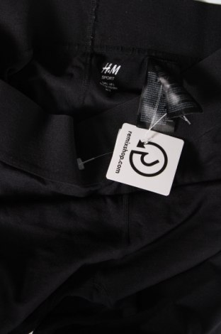 Γυναικείο κολάν H&M Sport, Μέγεθος L, Χρώμα Πολύχρωμο, Τιμή 4,41 €