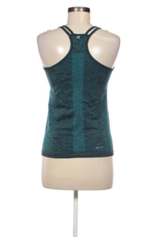 Top sport de damă. Nike, Mărime XS, Culoare Albastru, Preț 111,84 Lei