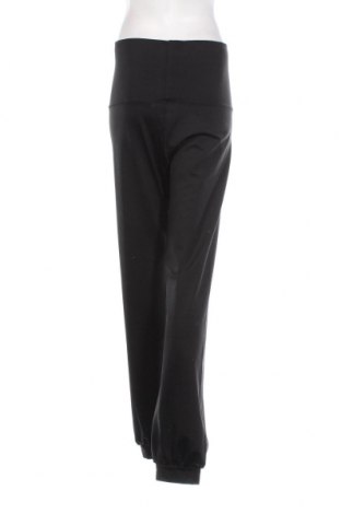 Γυναικείο αθλητικό παντελόνι Curare, Μέγεθος M, Χρώμα Μαύρο, Τιμή 31,96 €