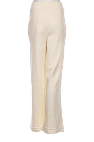 Γυναικείο αθλητικό παντελόνι FILA, Μέγεθος S, Χρώμα Εκρού, Τιμή 15,82 €