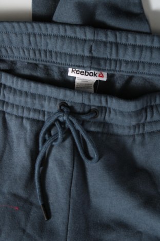 Damskie spodnie sportowe Reebok, Rozmiar M, Kolor Niebieski, Cena 124,58 zł