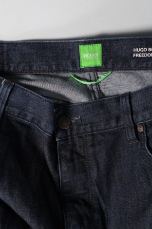 Pánske džínsy  BOSS, Veľkosť L, Farba Modrá, Cena  41,82 €