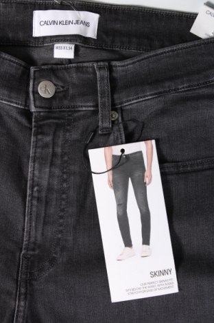 Męskie jeansy Calvin Klein Jeans, Rozmiar M, Kolor Czarny, Cena 205,61 zł