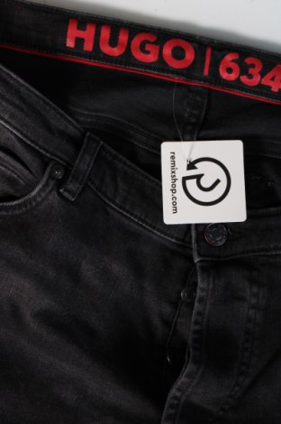 Pánske džínsy  Hugo Boss, Veľkosť XL, Farba Sivá, Cena  104,64 €