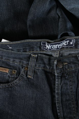 Pánské džíny  Wrangler, Velikost M, Barva Modrá, Cena  1 655,00 Kč