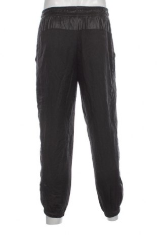 Ανδρικό αθλητικό παντελόνι Nike, Μέγεθος S, Χρώμα Μαύρο, Τιμή 25,36 €