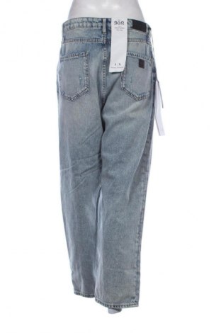 Damskie jeansy Armani Exchange, Rozmiar L, Kolor Niebieski, Cena 624,99 zł