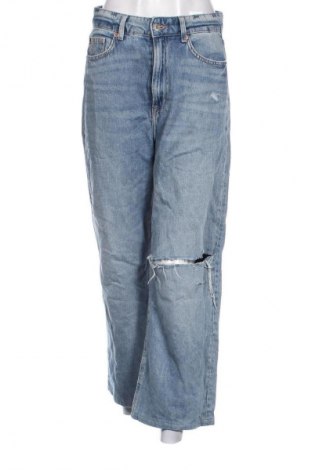 Damskie jeansy H&M, Rozmiar M, Kolor Niebieski, Cena 38,99 zł