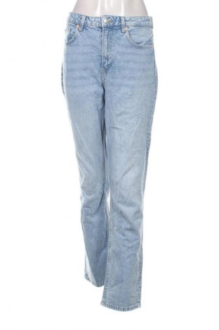 Damskie jeansy H&M, Rozmiar L, Kolor Niebieski, Cena 95,99 zł
