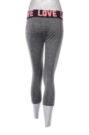 Damskie legginsy Colosseum, Rozmiar S, Kolor Kolorowy, Cena 38,99 zł