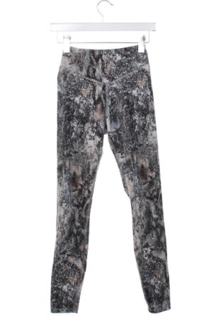Damskie legginsy Decathlon, Rozmiar XS, Kolor Kolorowy, Cena 85,99 zł