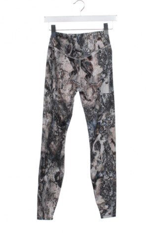 Damskie legginsy Decathlon, Rozmiar XS, Kolor Kolorowy, Cena 85,99 zł
