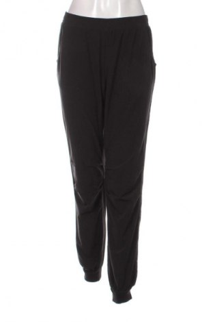 Dámské kalhoty  H&M Sport, Velikost L, Barva Černá, Cena  469,00 Kč