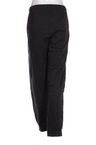 Damskie spodnie sportowe Bpc Bonprix Collection, Rozmiar 4XL, Kolor Czarny, Cena 95,99 zł